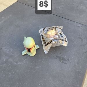 Green and Red Collectible Figurine